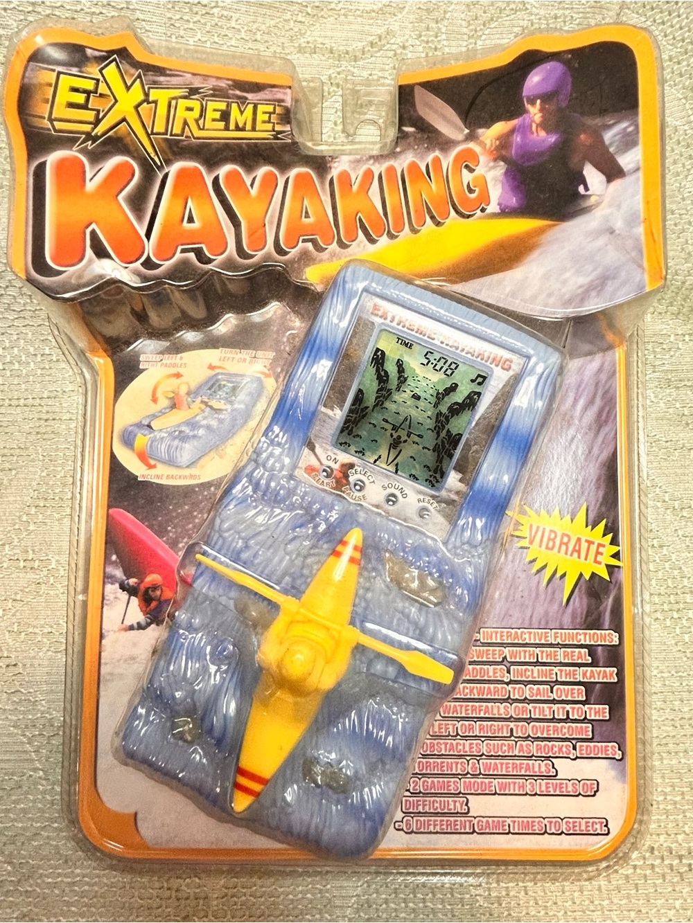 Extreme Kayaking Handheld Game — Blue and Yellow